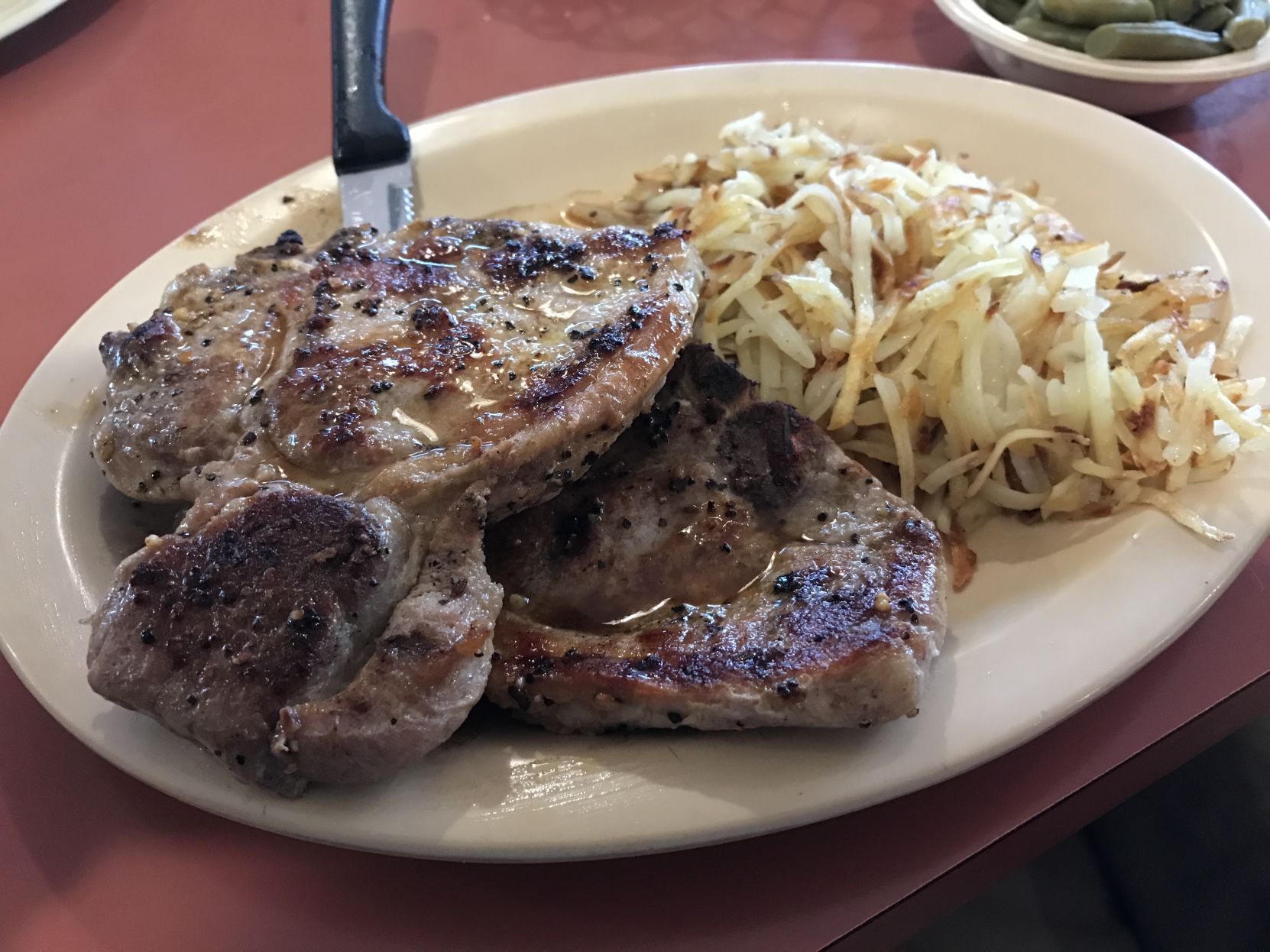 TASTE TEST: Red Rooster pork chops will make you forget other white meat